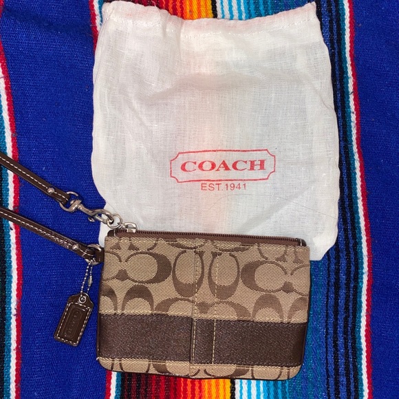 Coach Handbags - Pre-owned tan Coach wristlet